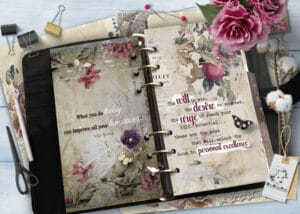 Open scrapbook with floral patterned pages, quotes, and stationary on a light blue wooden table