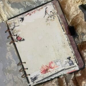 Vintage blank notes printable insert in an open ring binder planner. Distressed antique parchment background with soft pink roses, butterflies, lace overlays, antique script snippets, and a pointing hand detail. Shabby chic romantic style for A4 and A5 planners, digital download PDF and JPG.