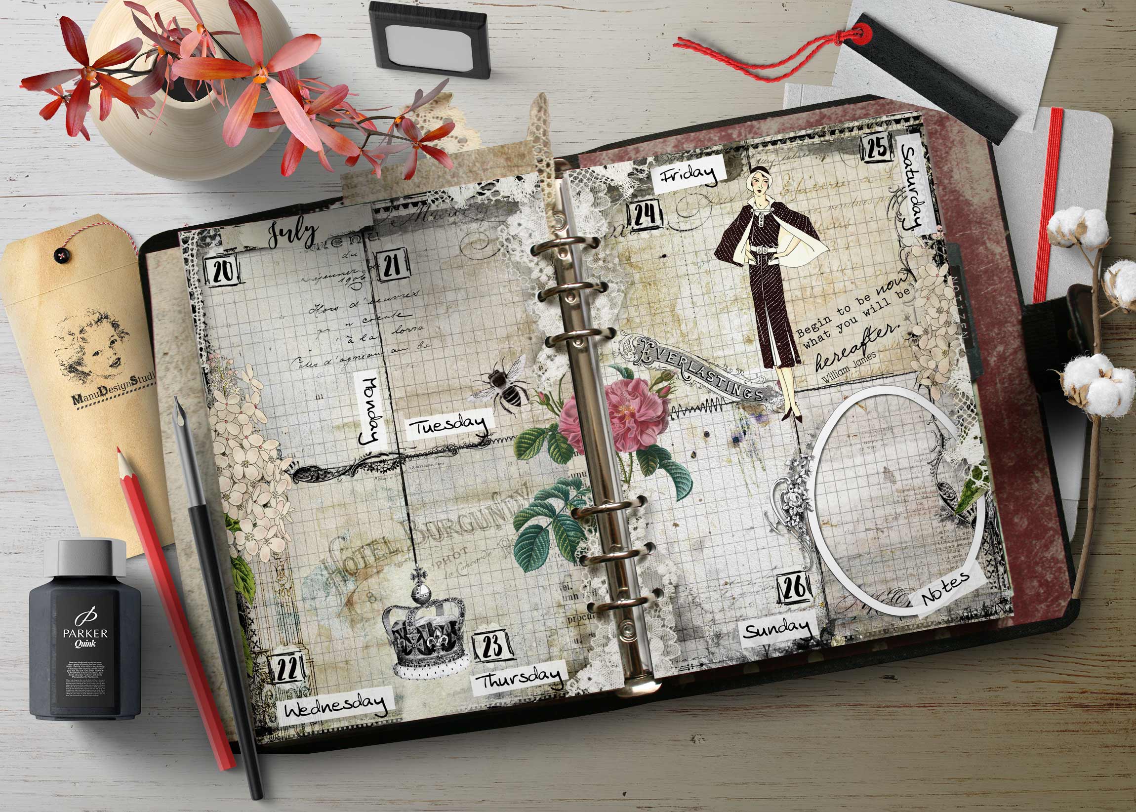 Open decorative planner with handwritten day labels and floral collage on a wooden desk, surrounded by stationery.
