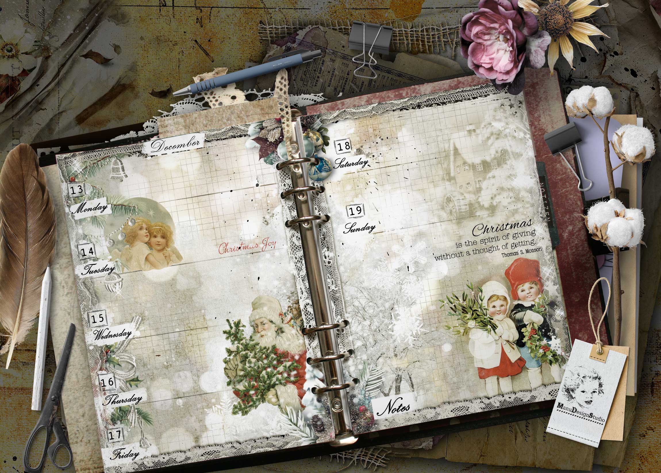 A vintage scrapbook planner open to December with handwritten days, Christmas illustrations, lace trim, and a metal binder ring notebook held by a pen. A5 weekly planner with vintage child and floral illustrations