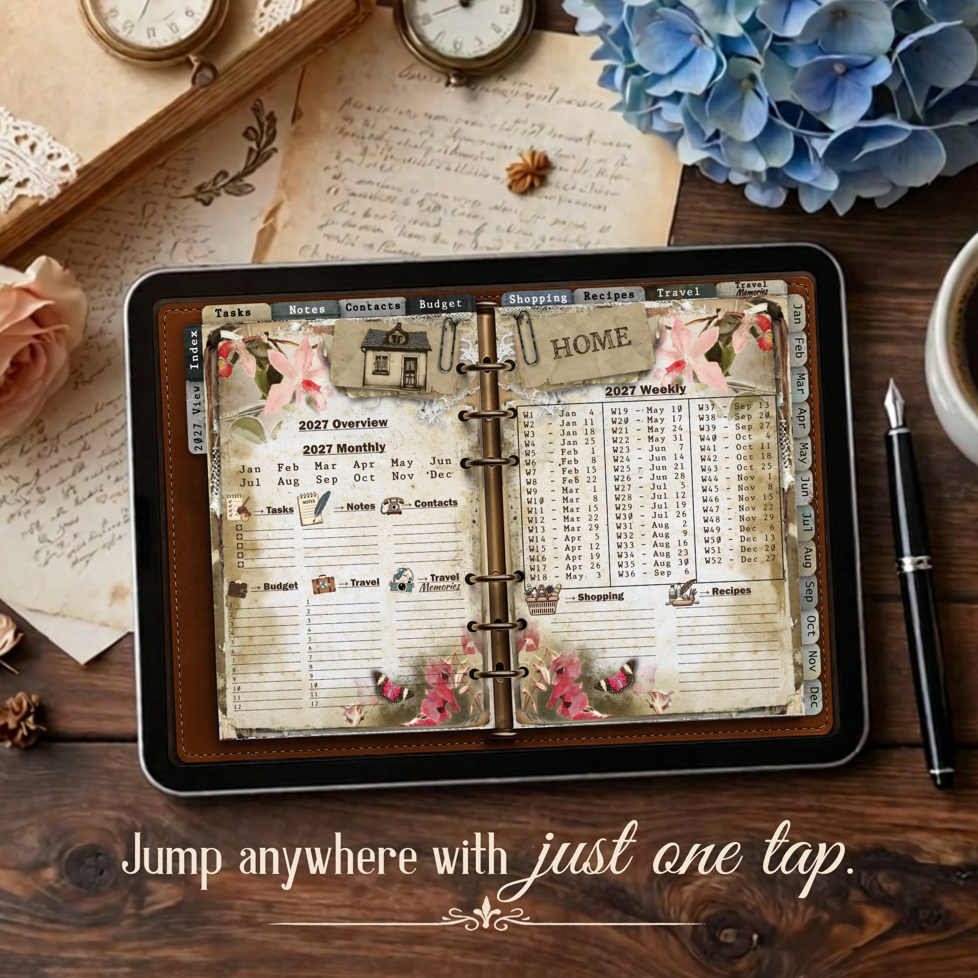 Open leather planner with vintage handwritten pages - monthly budget tracker pages, calendar inserts, and decorative floral accents on a wooden desk near blue hydrangeas and clocks.