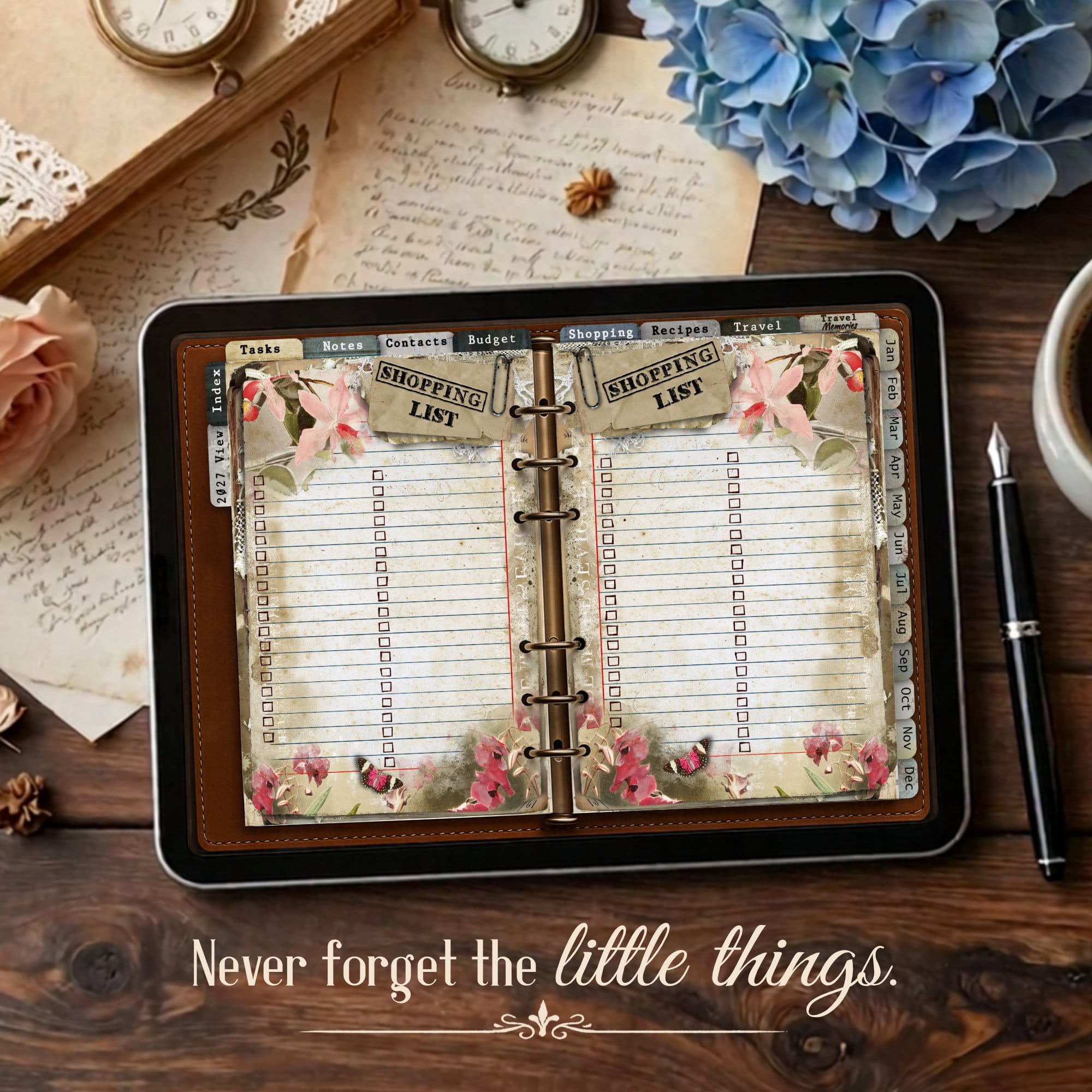 Open vintage digital planner on a wooden desk with floral accents and blue hydrangeas; visible tabs show Shopping List and Notes, decorative clock nearby.