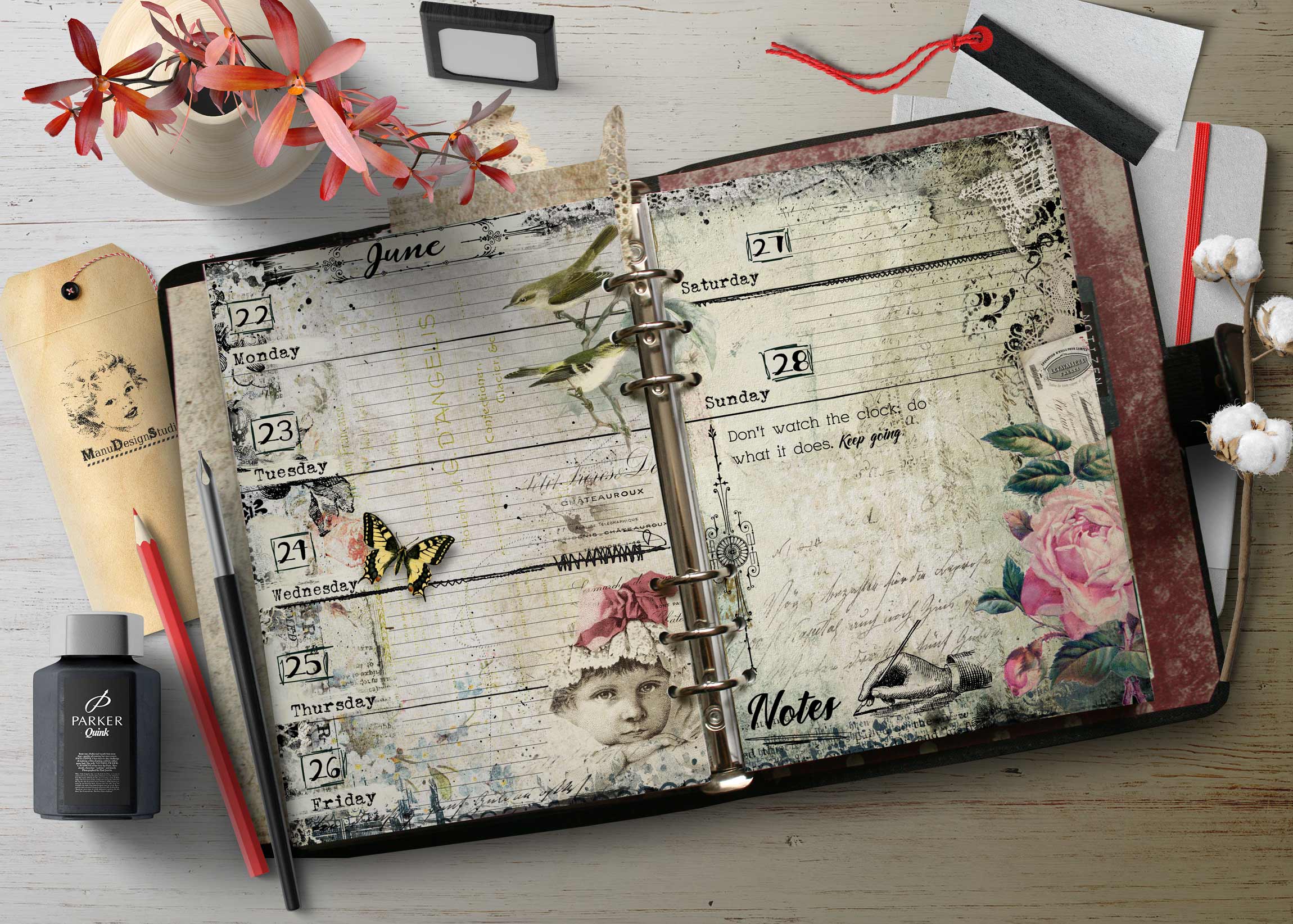 Open vintage planner with decorative scrapbook pages, showing June and daily sections, butterfly and floral accents, and binder rings.